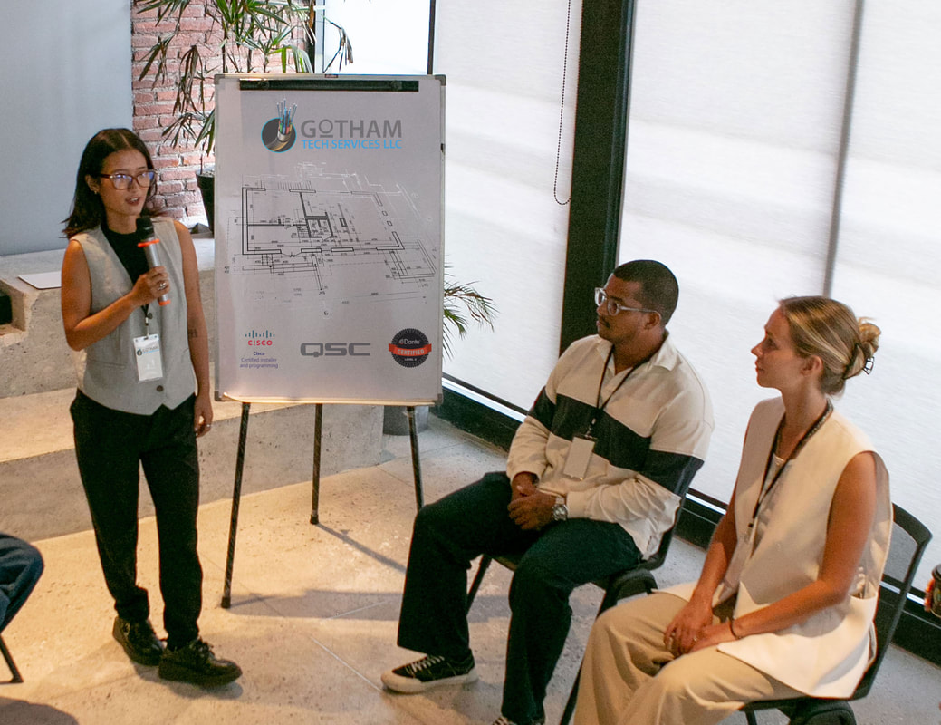 GTS technician presenting tech solution to clients